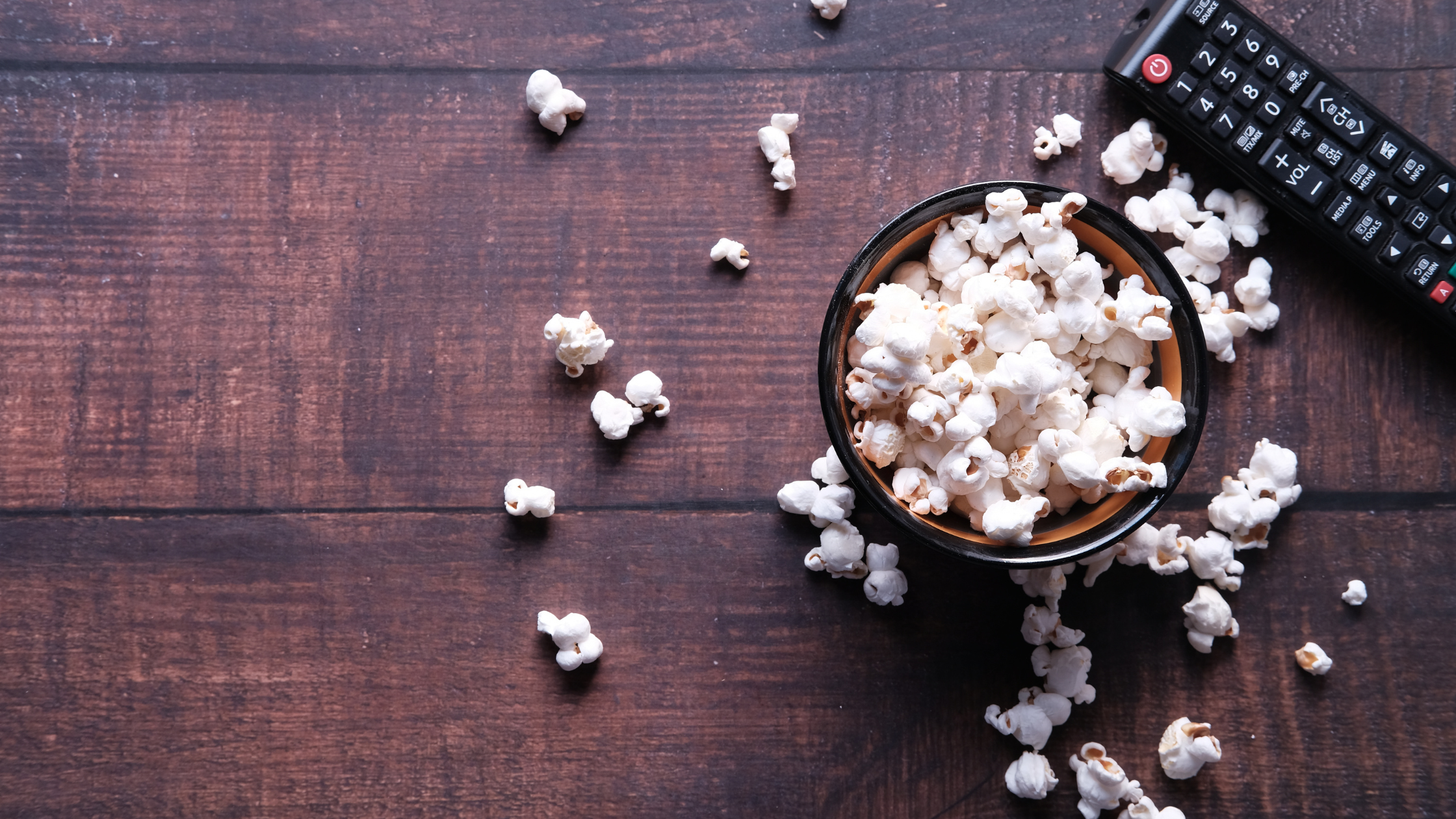 popcorn and remote to watch nostalgic movies